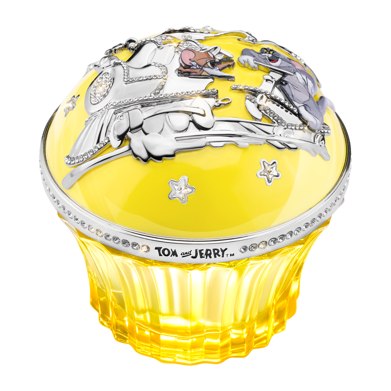 House of Sillage luxury fragrance in yellow bottle with Tom and Jerry on top. 

